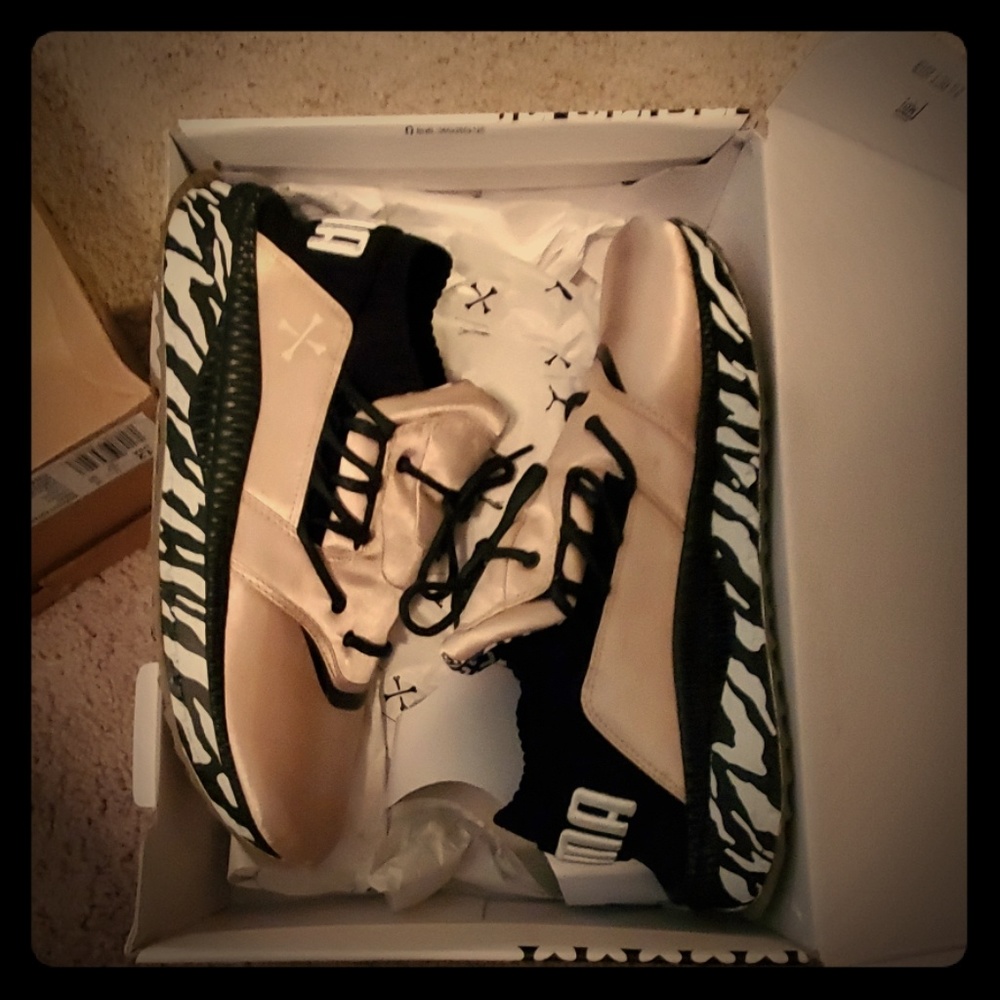 Gold puma sneakers